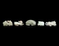 Five Chinese Carved Celadon Jade Figures of Recumbent Animals
