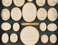 A Collection of Grand Tour Style Plaster Intaglios in Four Frames