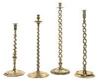 Four English Brass Barley Twist Candlesticks, Height of tallest 22 1/2 inches.