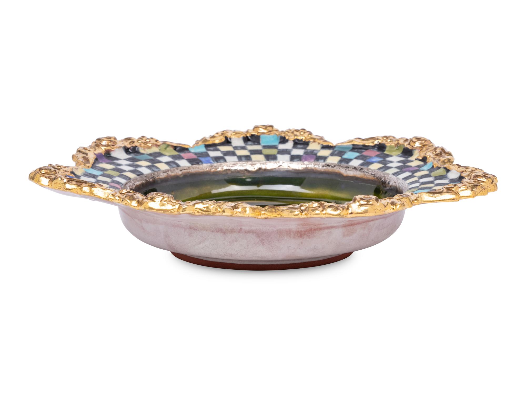 A Set of Fourteen MacKenzie-Childs Evervolving Ceramic Bowls