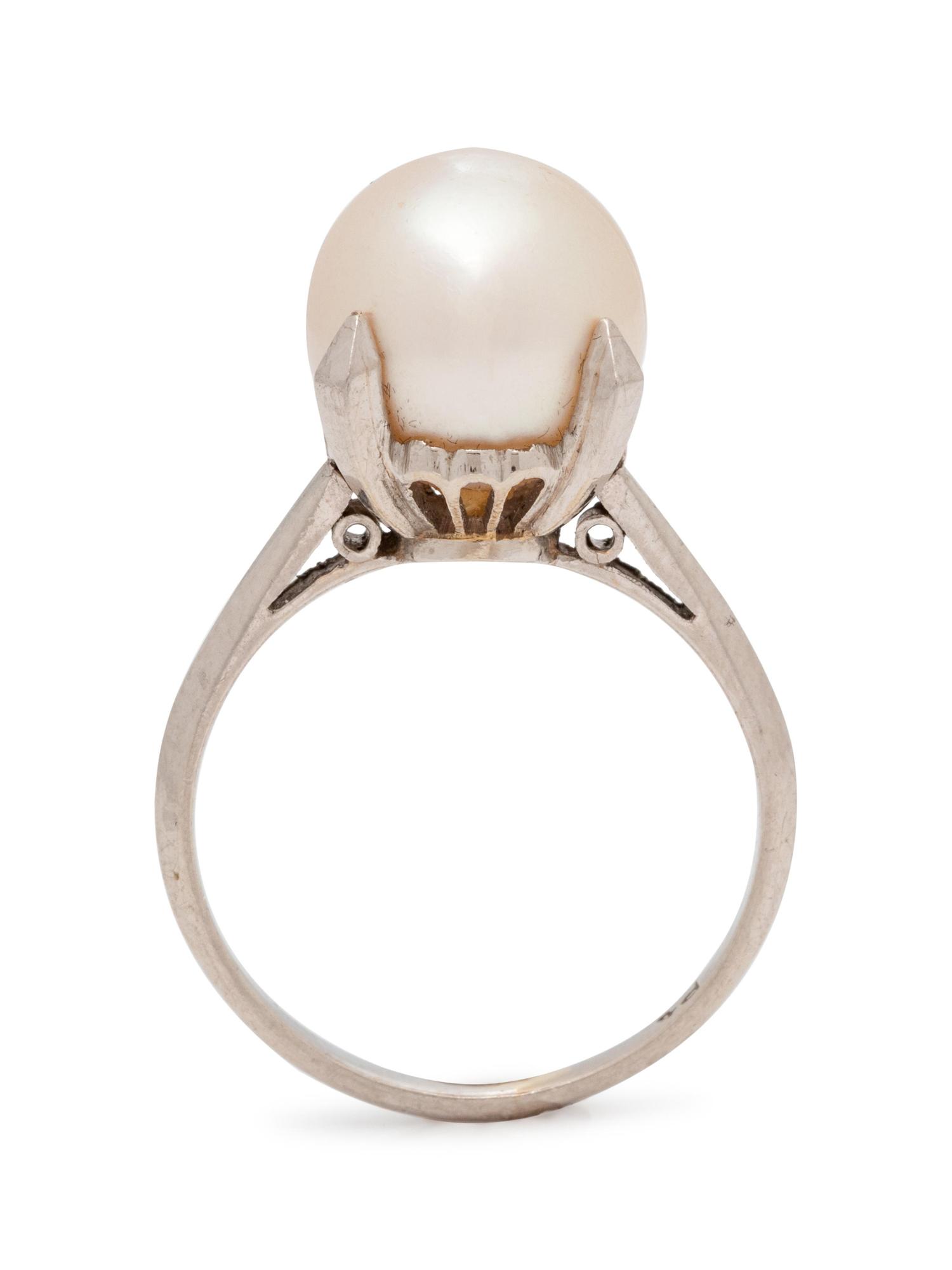 A Platinum and Cultured Pearl Ring,