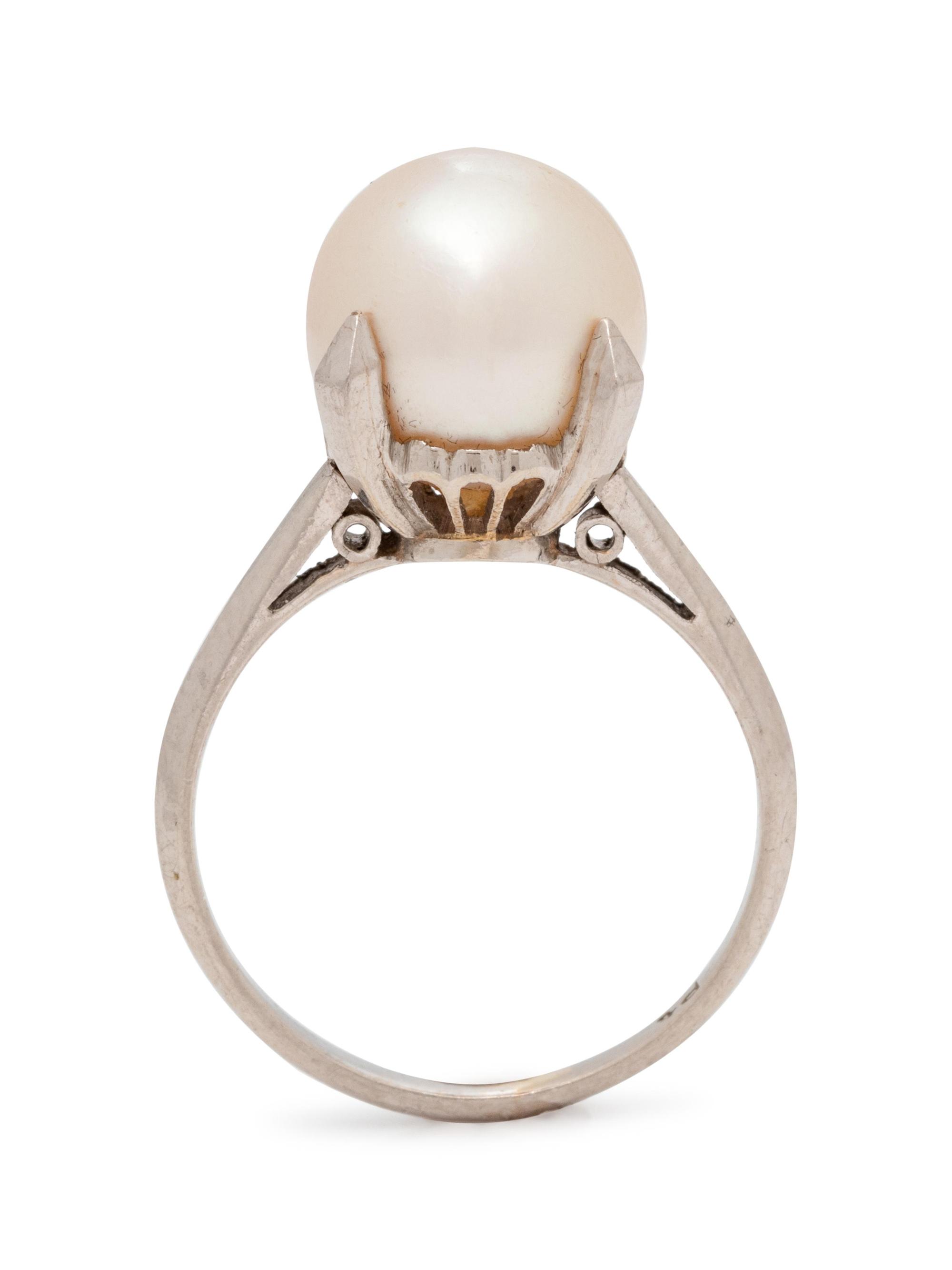 A Platinum and Cultured Pearl Ring,