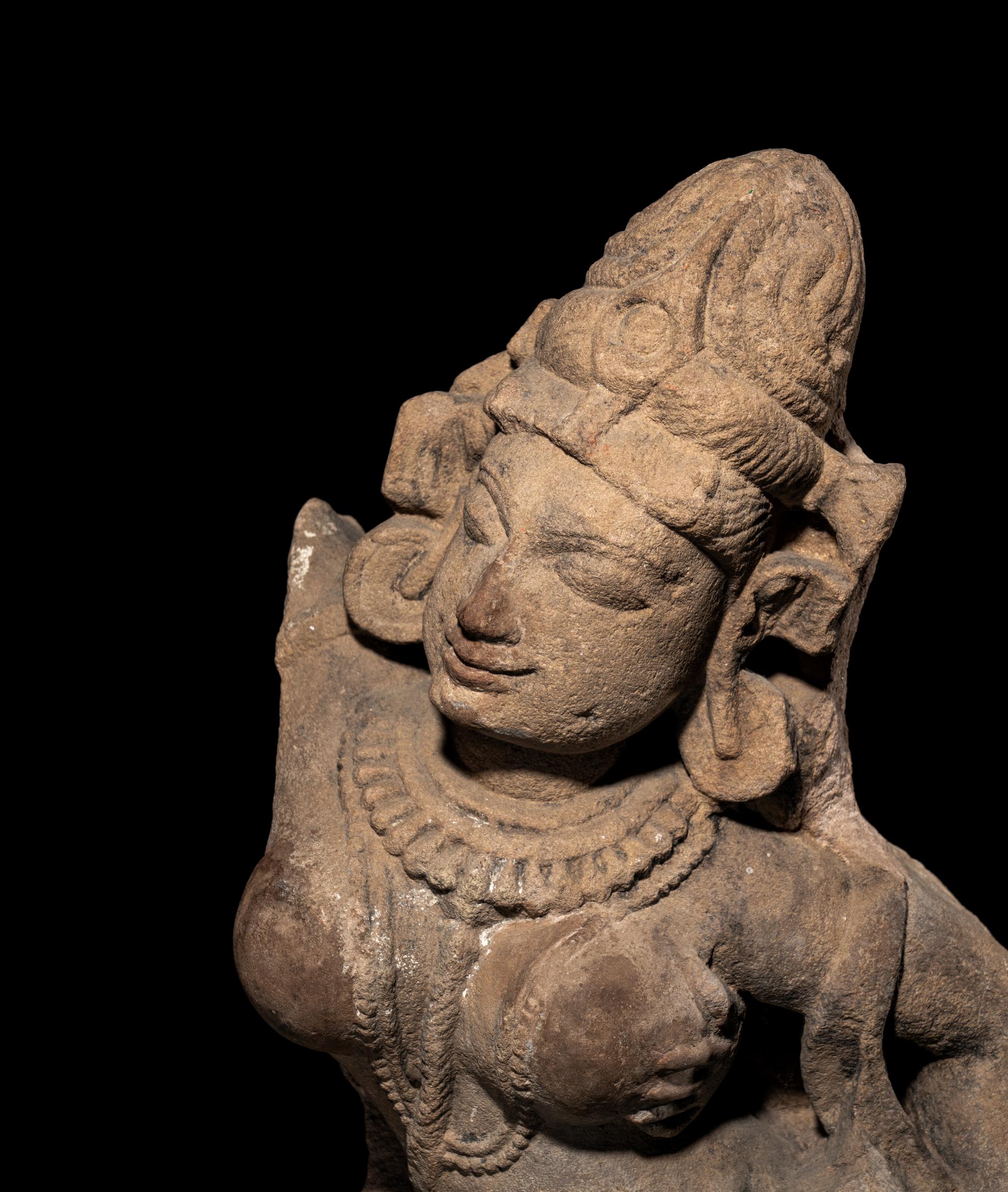 An Indian Red Sandstone Figure of a Female Deity