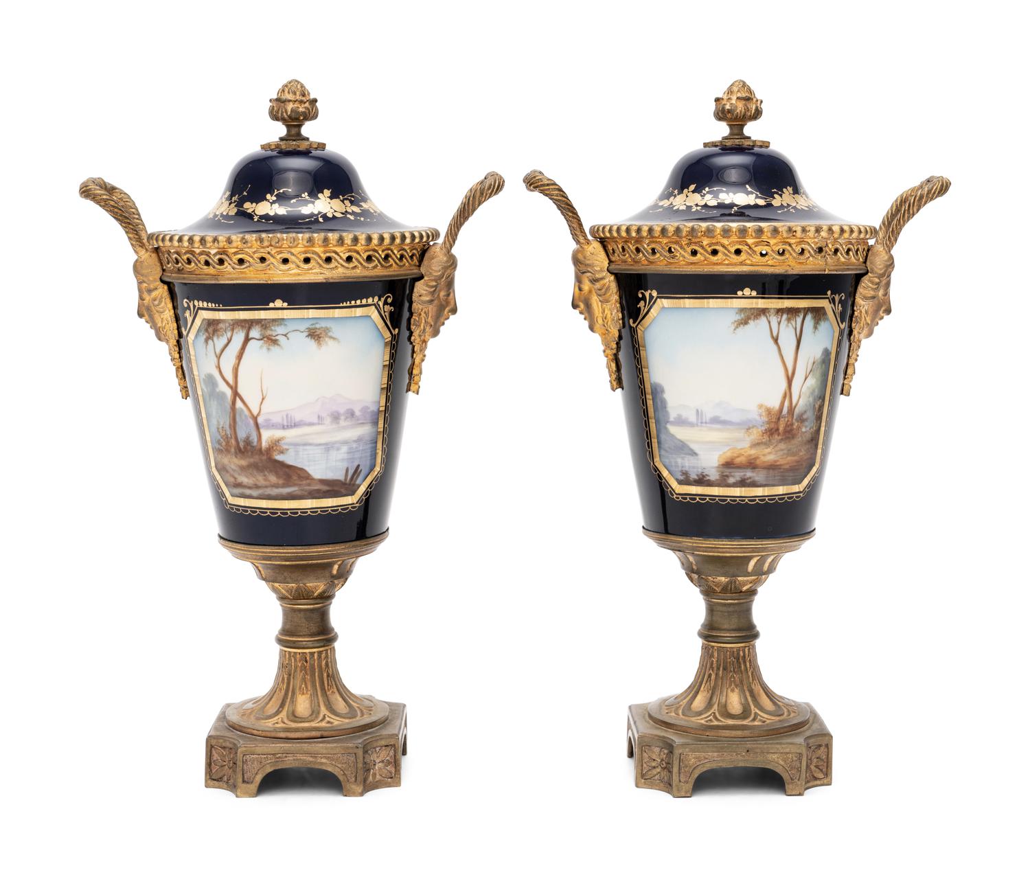 A Pair of Sèvres Style Gilt Bronze-Mounted Porcelain Urns