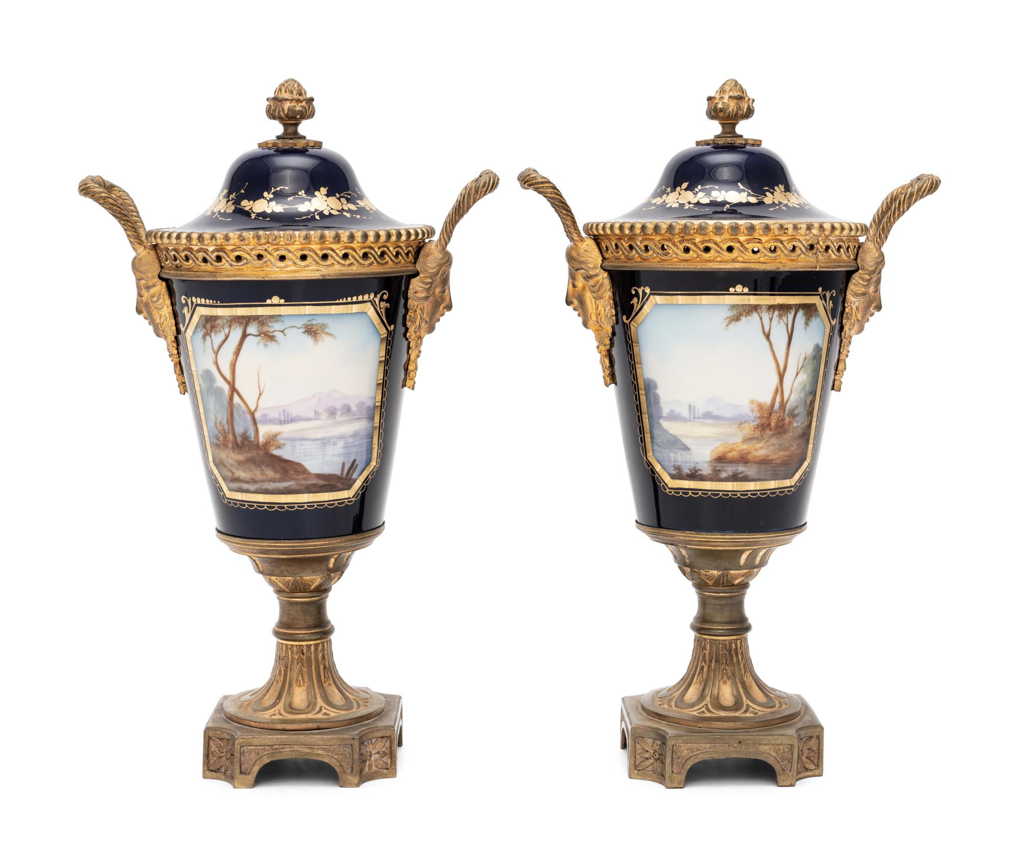 A Pair of Sèvres Style Gilt Bronze-Mounted Porcelain Urns