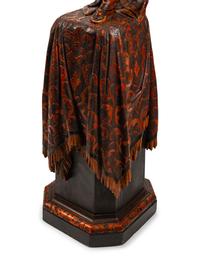 An Austrian Carved and Stained Wood Figural Torchère — LATE 19TH CENTURY