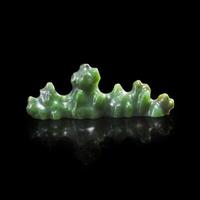 A Chinese carved spinach jade "Mountain" brush rest 菠菜綠玉筆架