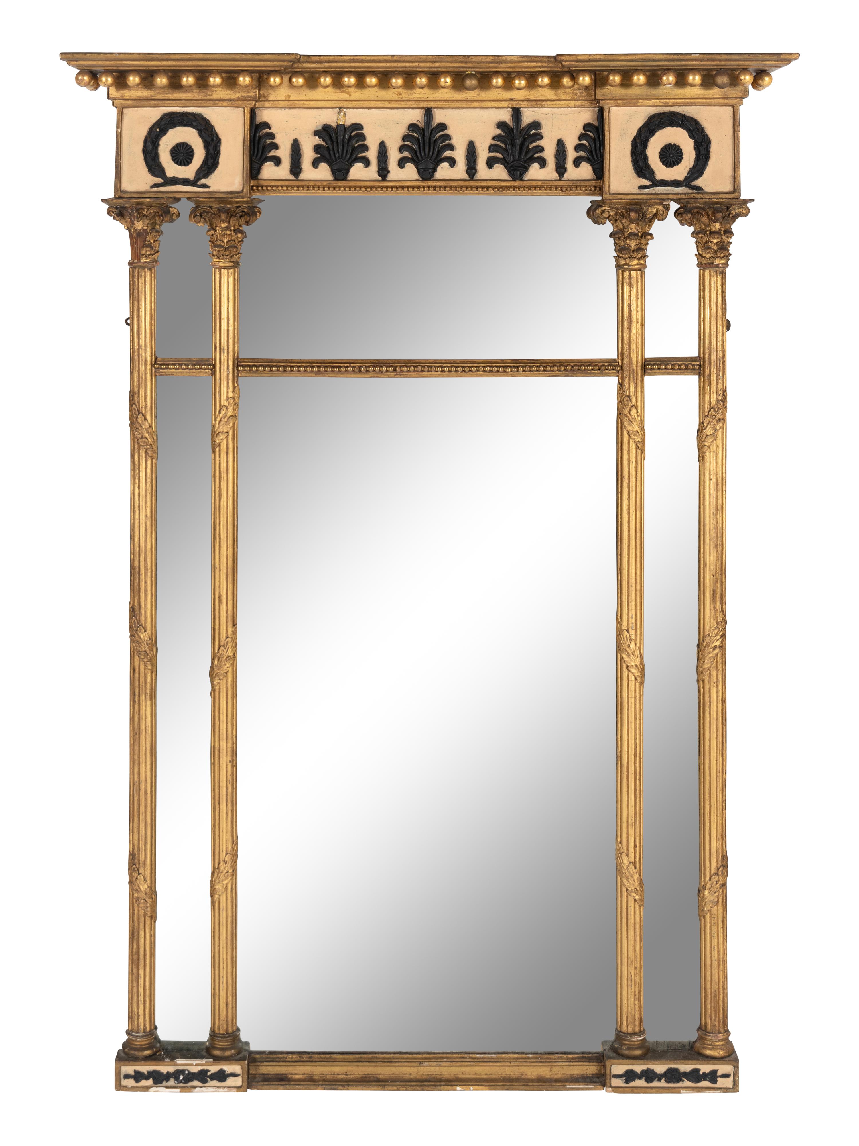A Regency Giltwood and Part Ebonized Mirror
