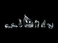 A Group of Seven Steuben Glass Figures of Birds