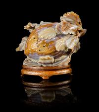 An Agate Carving of Bitter Melons Length 6 inches. — 20TH CENTURY