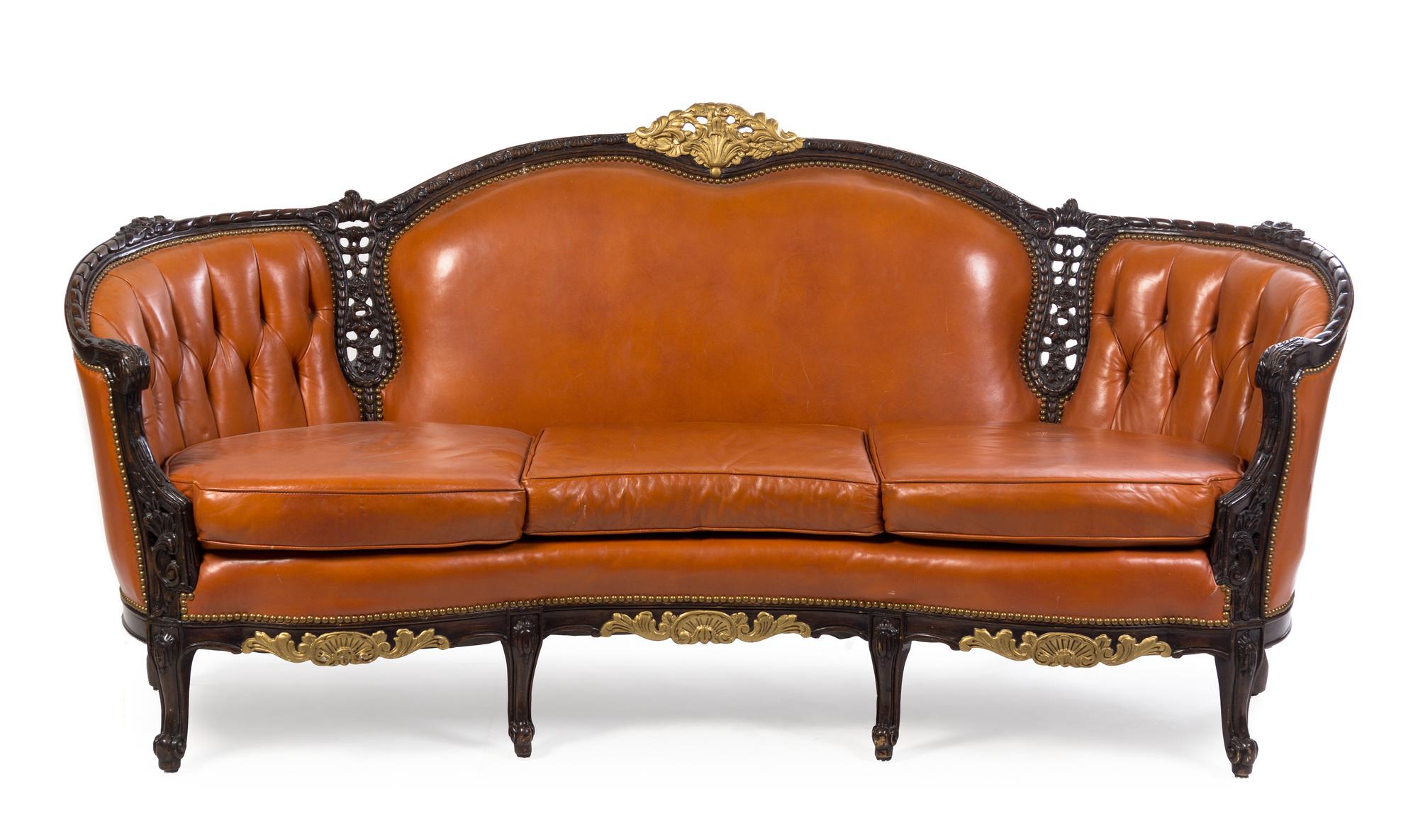 A Louis XV Style Parcel Gilt Parlor Suite Height 37 1/2 x width 80 x depth 34 inches.