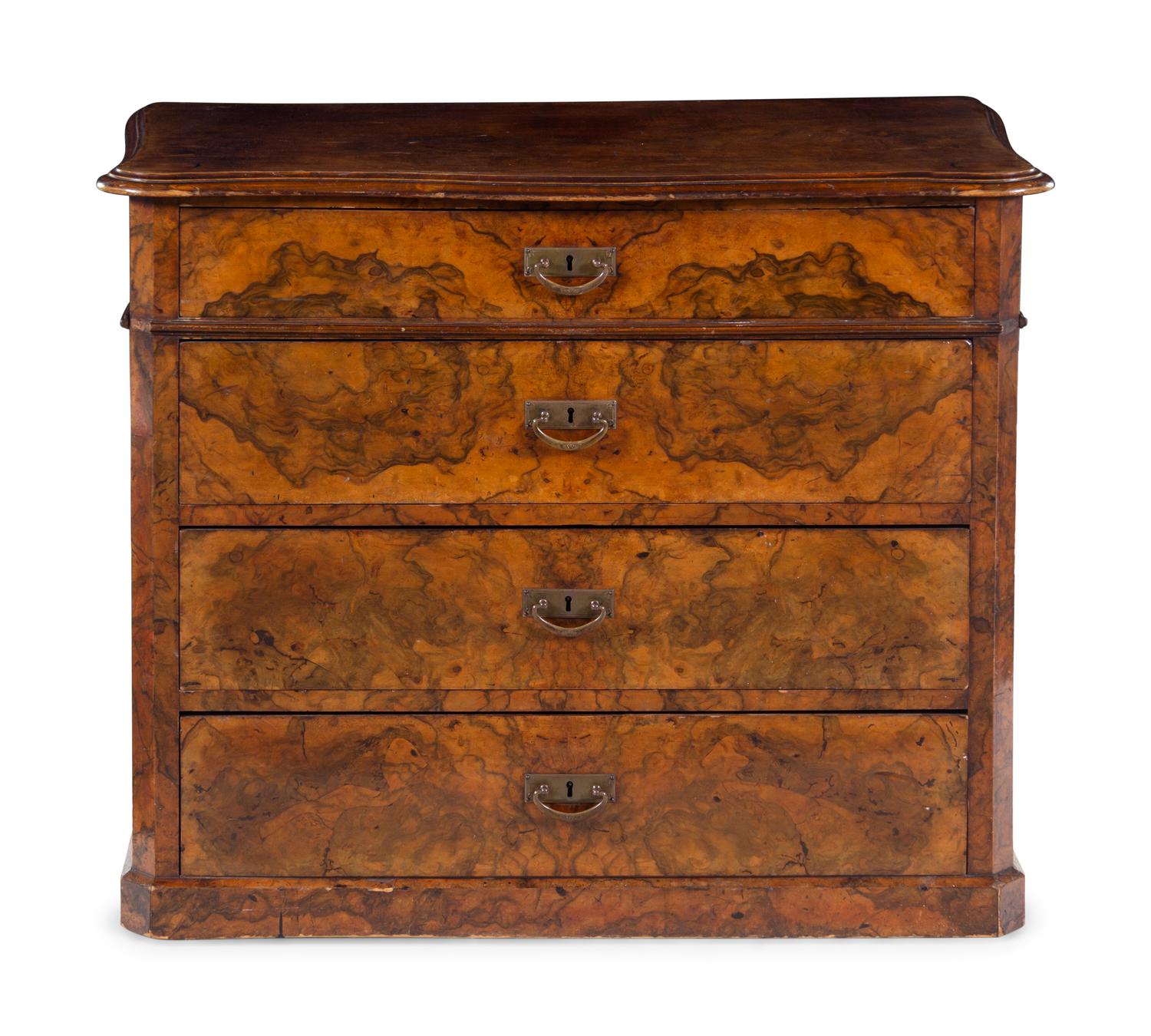 An Italian Walnut Chest of Drawers