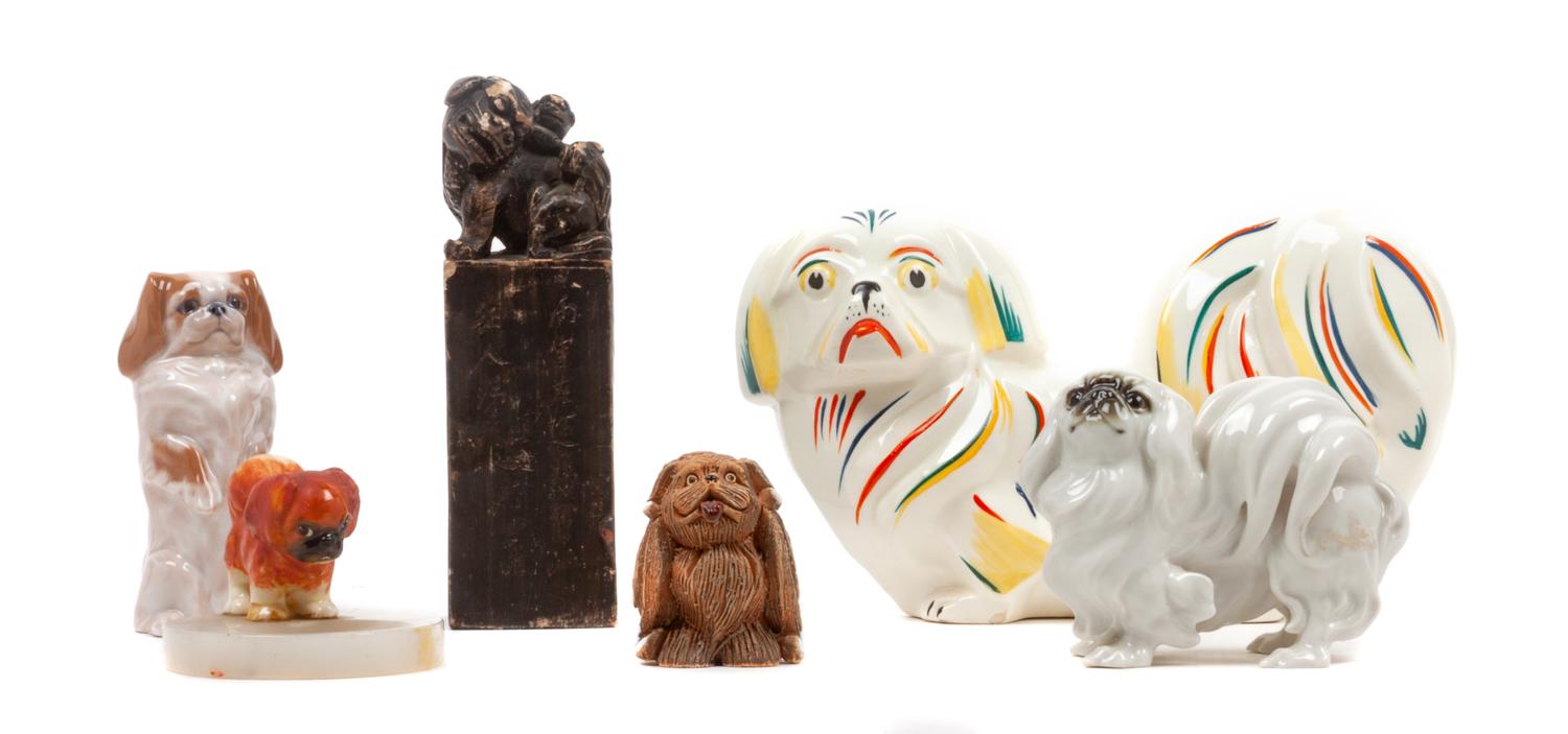 A Group of Six Pekingese Figures Width of widest 9 1/2 inches.