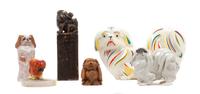 A Group of Six Pekingese Figures Width of widest 9 1/2 inches.