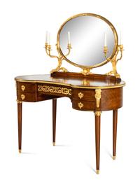 A Louis XVI Style Gilt Bronze Mounted Mahogany Dressing Table and Mirror