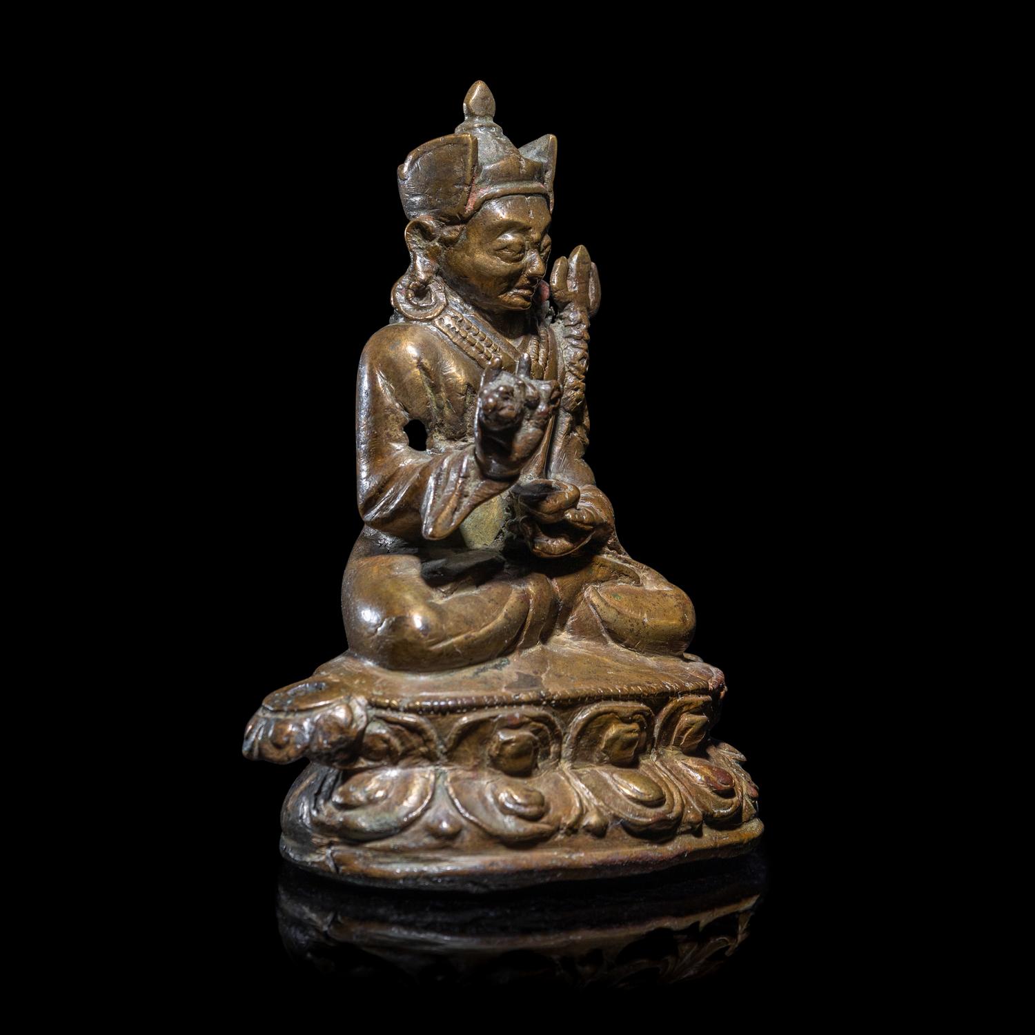 A Tibetan Copper Alloy Seated Figure of Padmasambhava, 16th/17th Century 十六/十七世紀 西藏銅合金銅蓮花生坐像