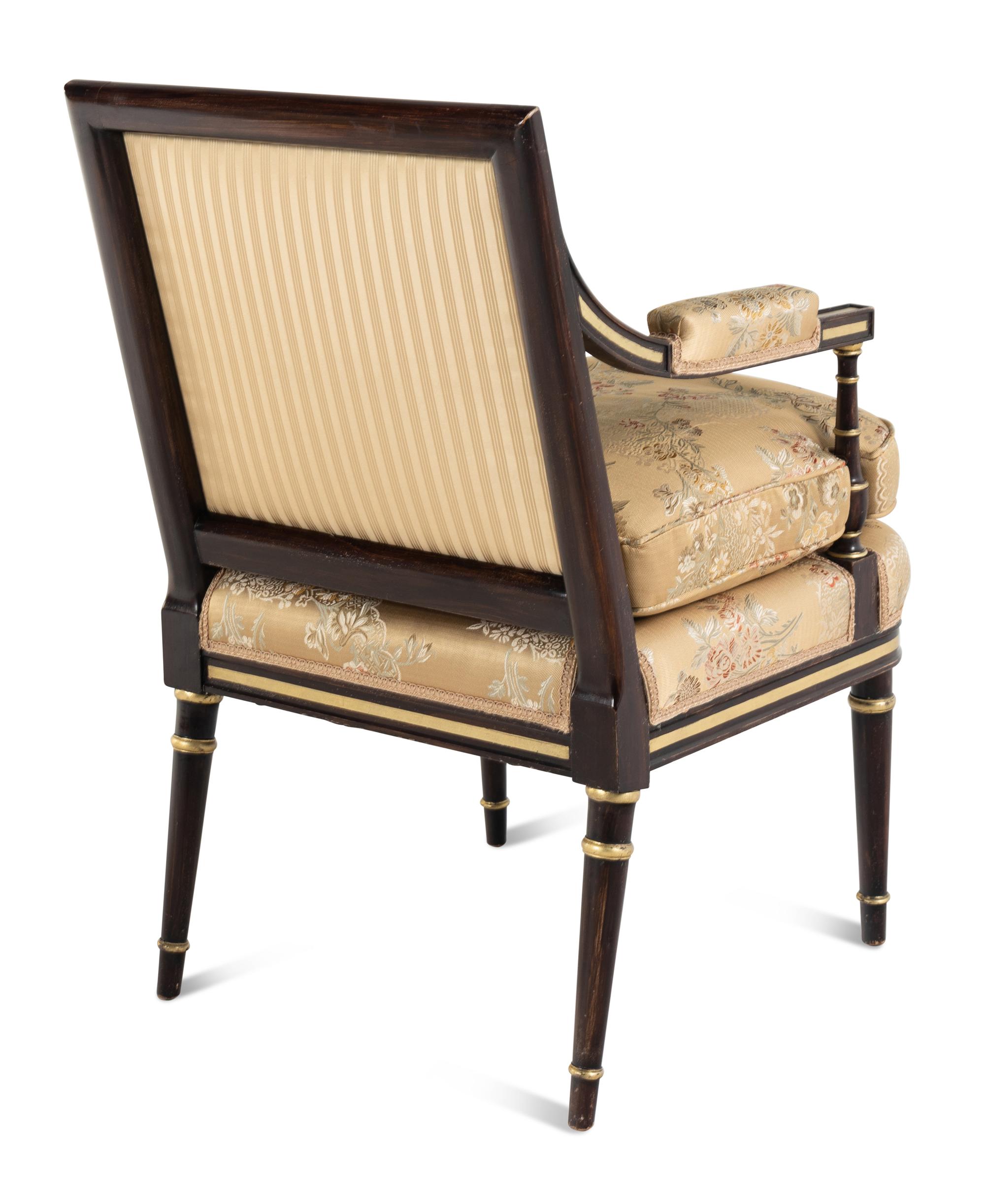 A Pair of Regency Style Painted and Parcel Gilt Armchairs