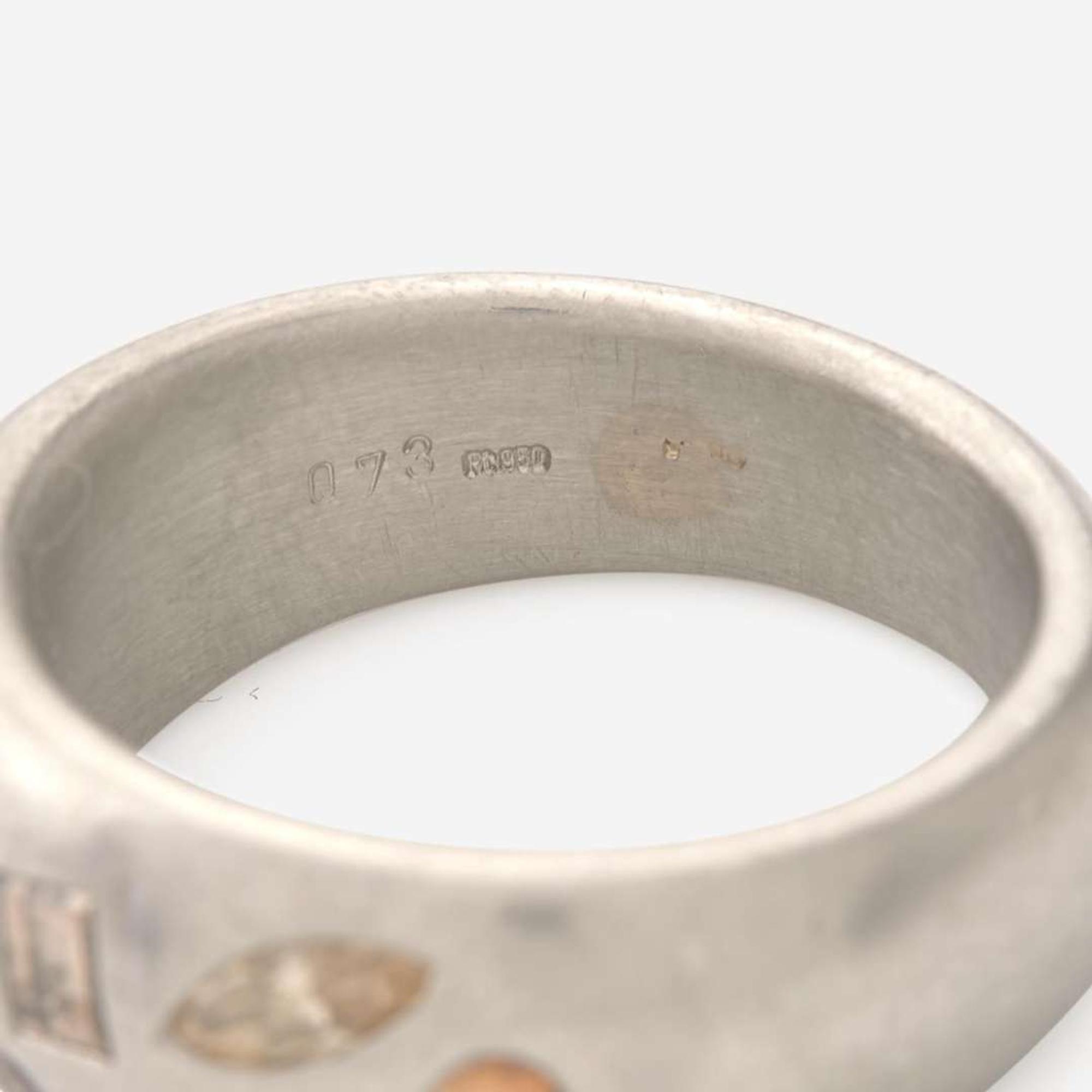 A Platinum and Multi-Colored Diamond Band