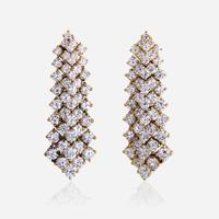 A pair of diamond and eighteen karat gold earrings
