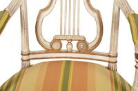 A Continental Painted and Parcel Gilt Fauteuil