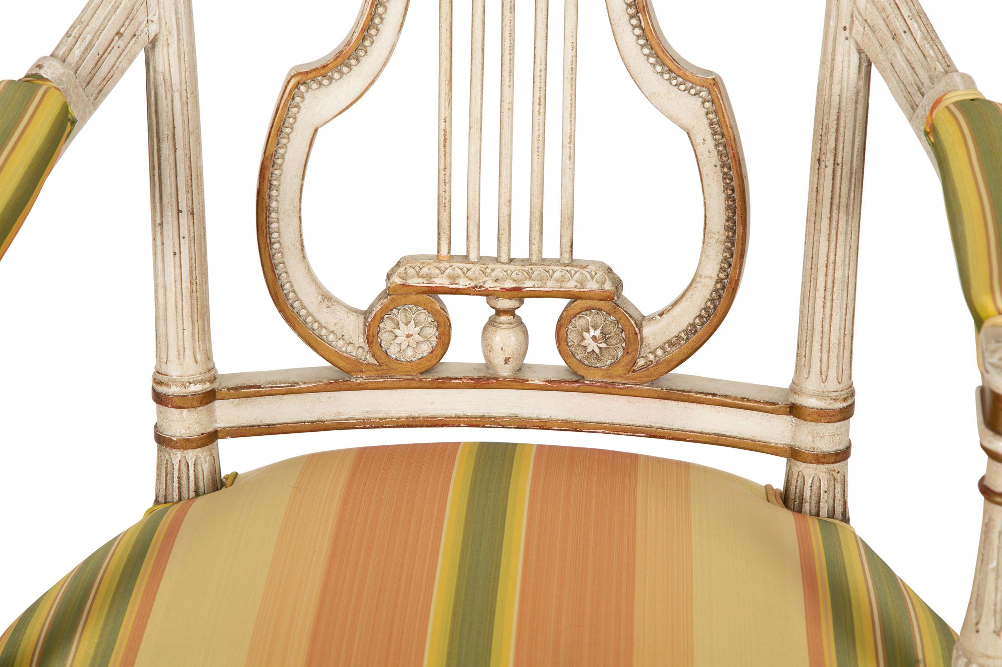 A Continental Painted and Parcel Gilt Fauteuil