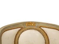 A French Provincial Style Painted and Parcel Gilt Chaise Longue