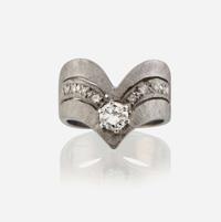 A diamond and white gold ring