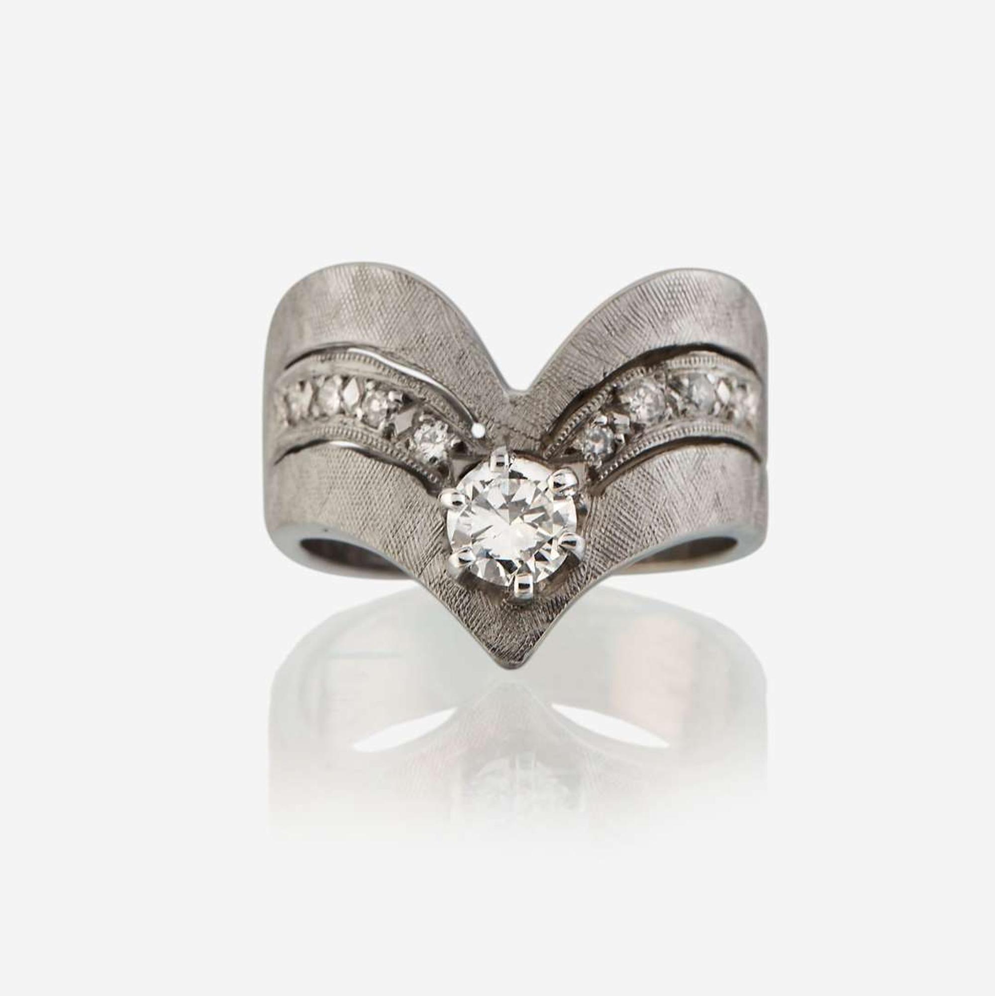 A diamond and white gold ring