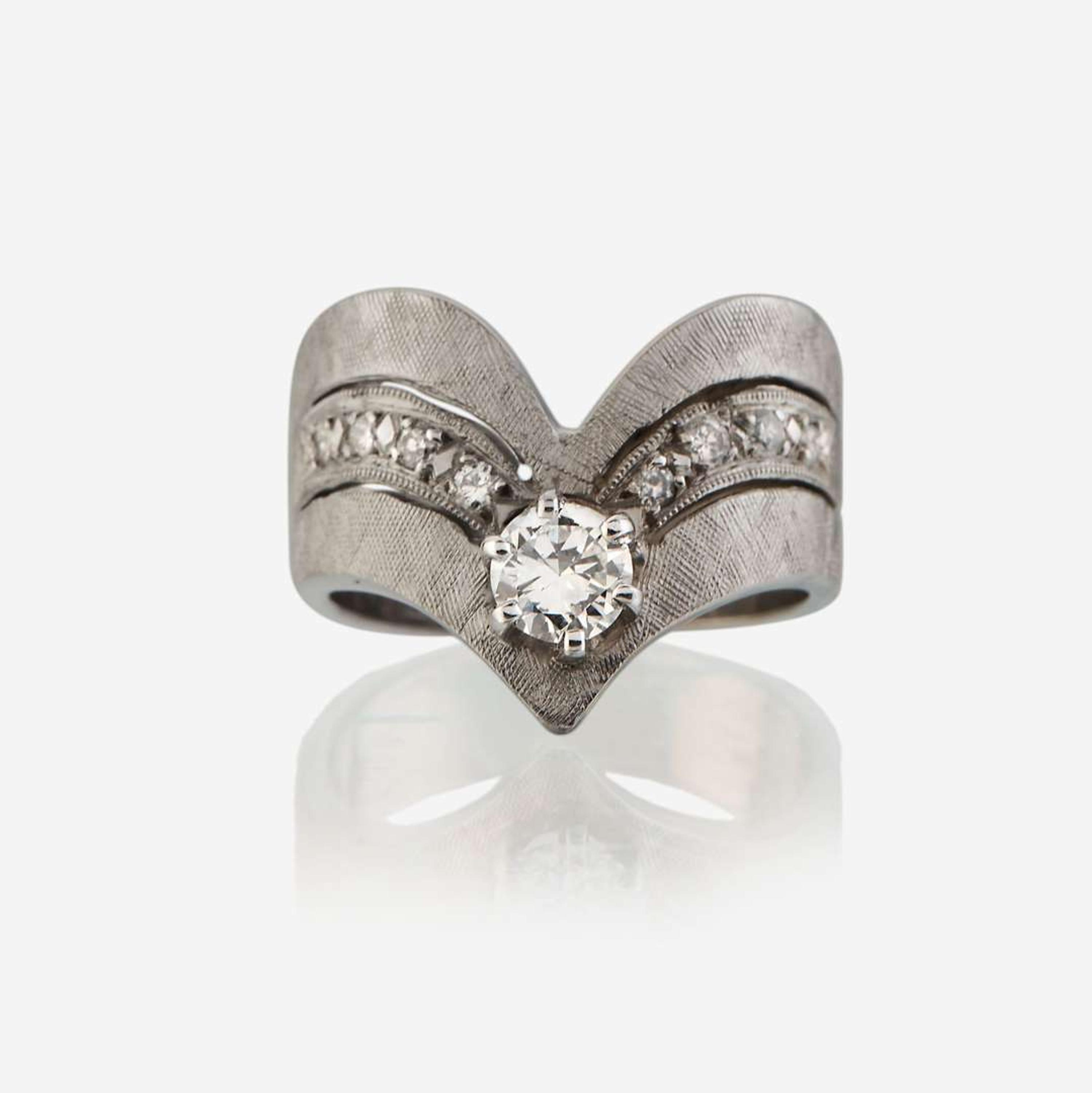 A diamond and white gold ring