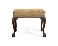 A George III Style Carved Mahogany Stool with Needlepoint Upholstery