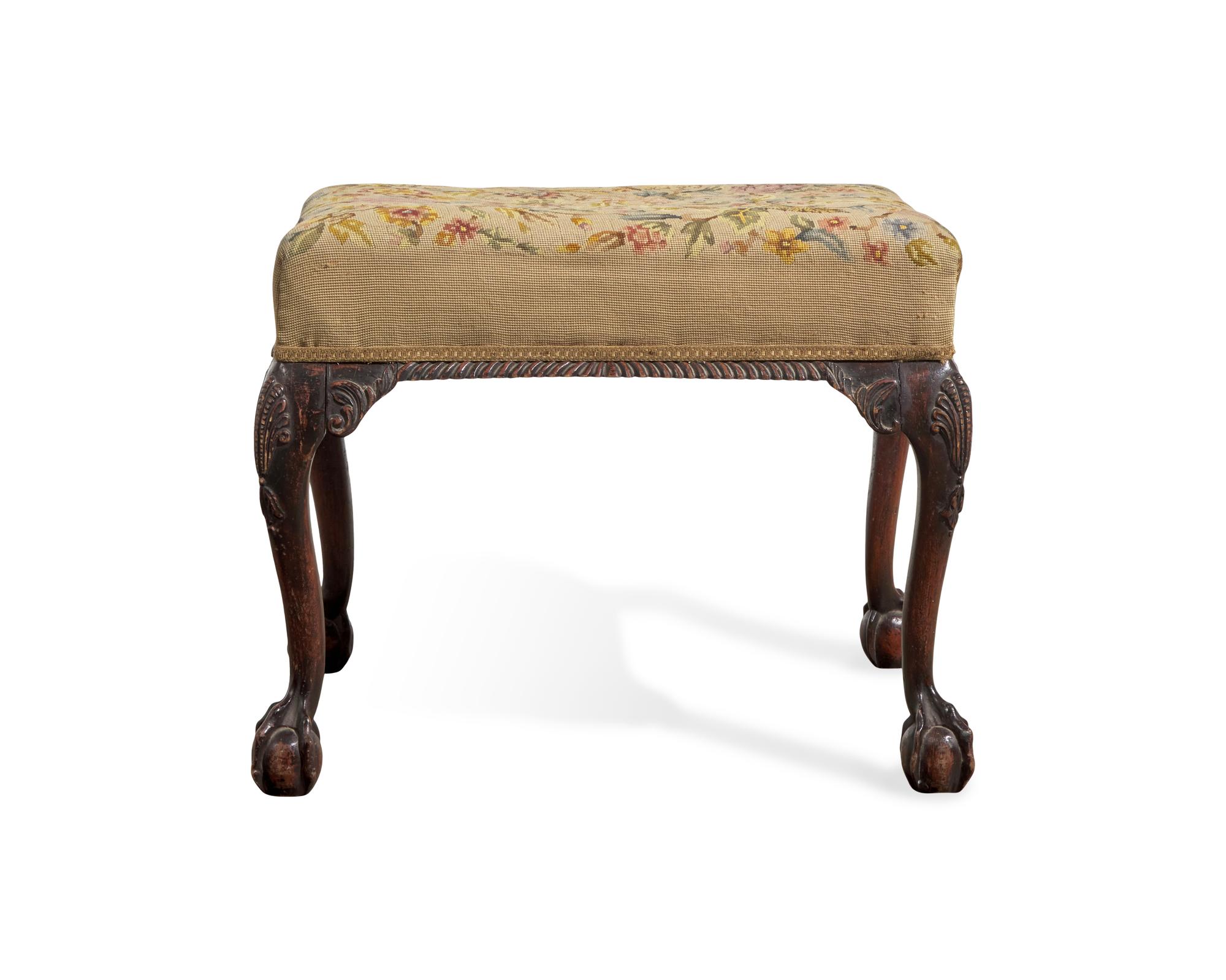A George III Style Carved Mahogany Stool with Needlepoint Upholstery