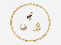 An Omega Necklace with Two Charms and A Diamond Ring