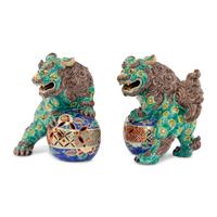A Pair of Chinese Porcelain Guardian Lions