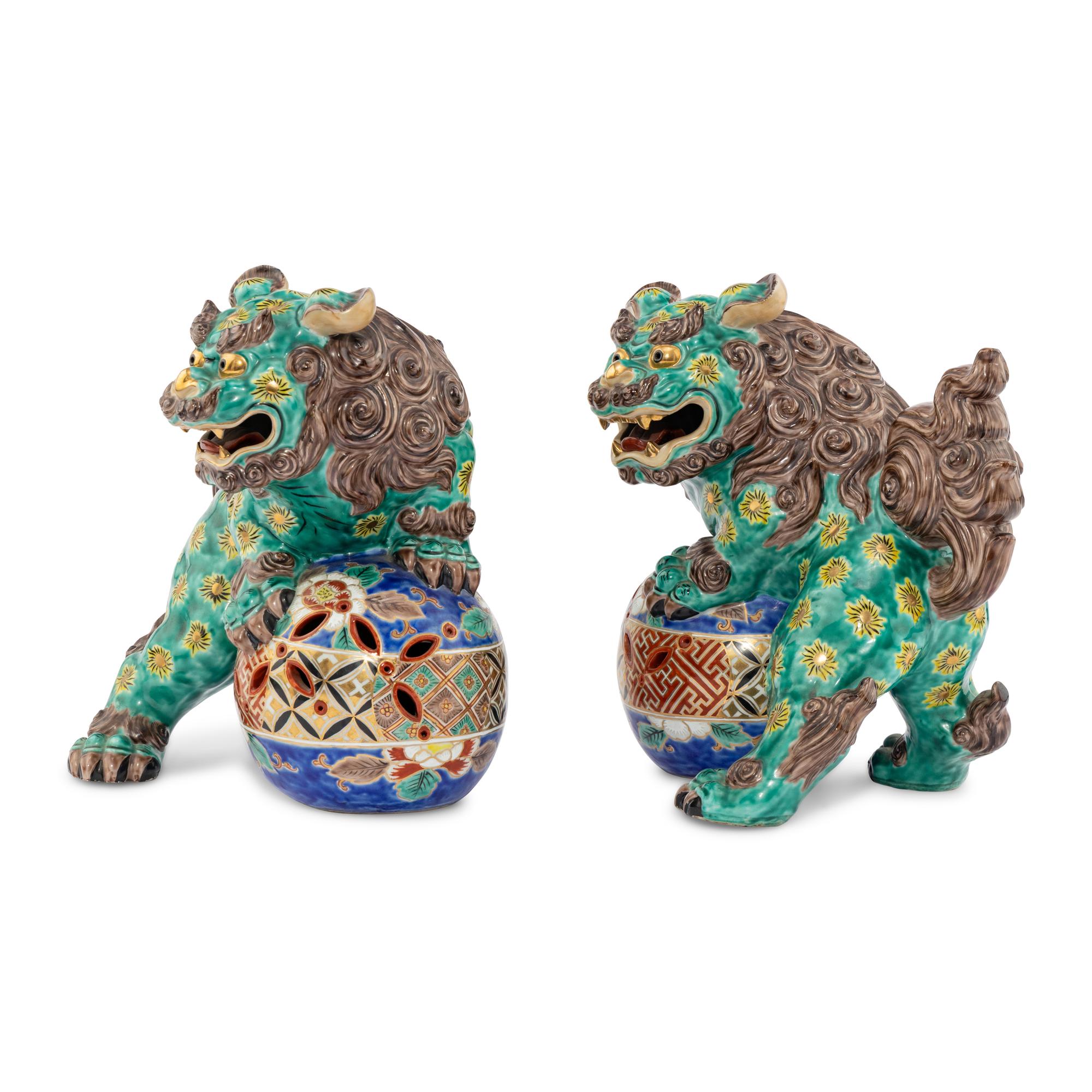 A Pair of Chinese Porcelain Guardian Lions