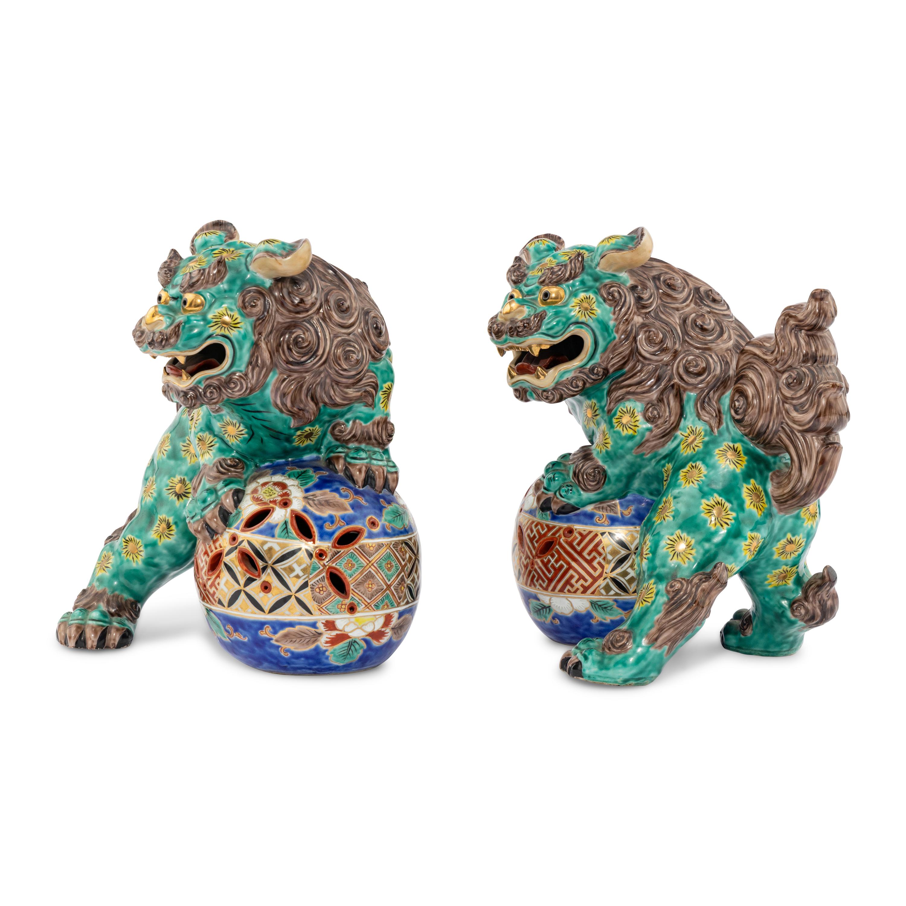 A Pair of Chinese Porcelain Guardian Lions