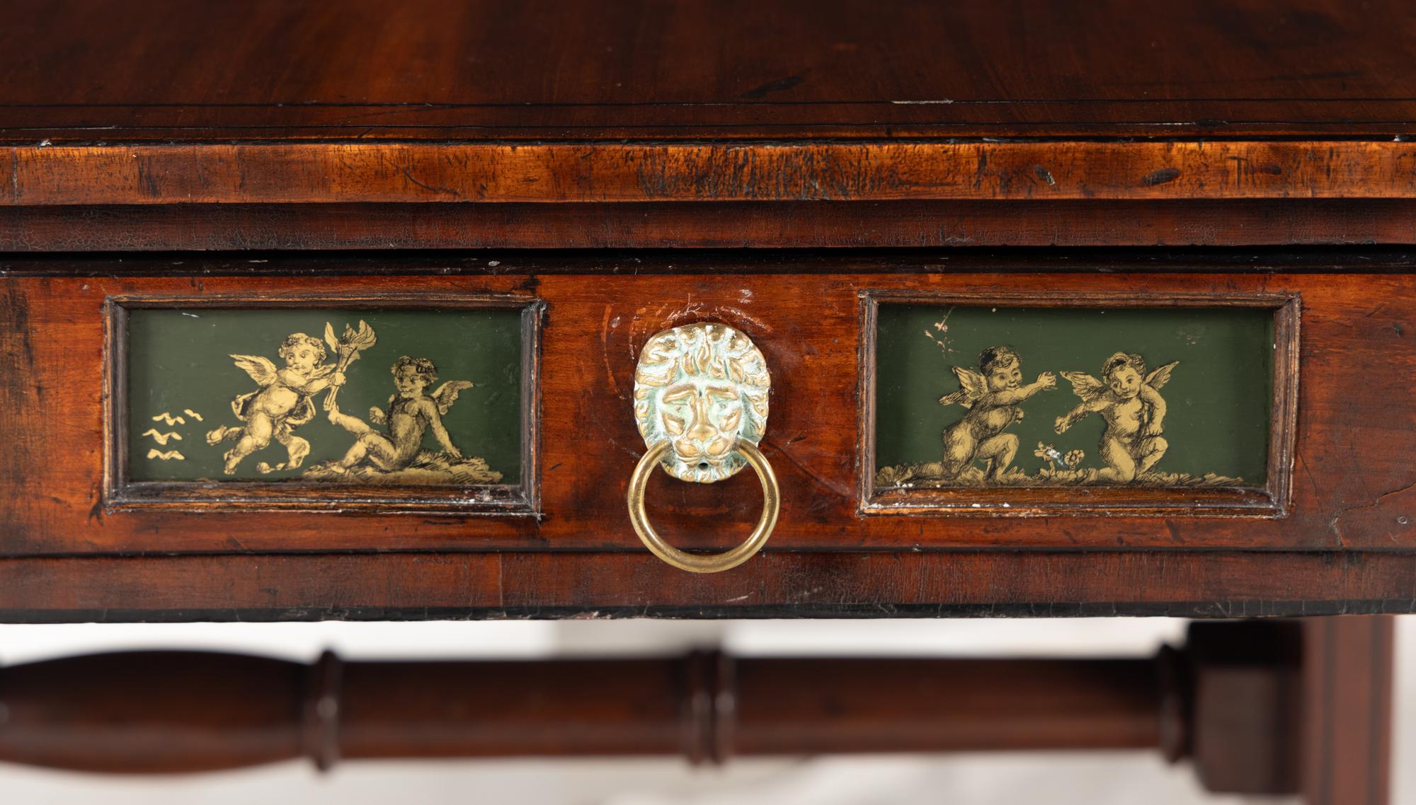 A Regency Mahogany and Églomisé Sofa Table