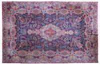 A Kirman Carpet 13 feet 11 inches x 9 feet 9 1/2 inches.