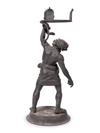 A Grand Tour Bronze Figure of Silenus Wrestling a Serpent