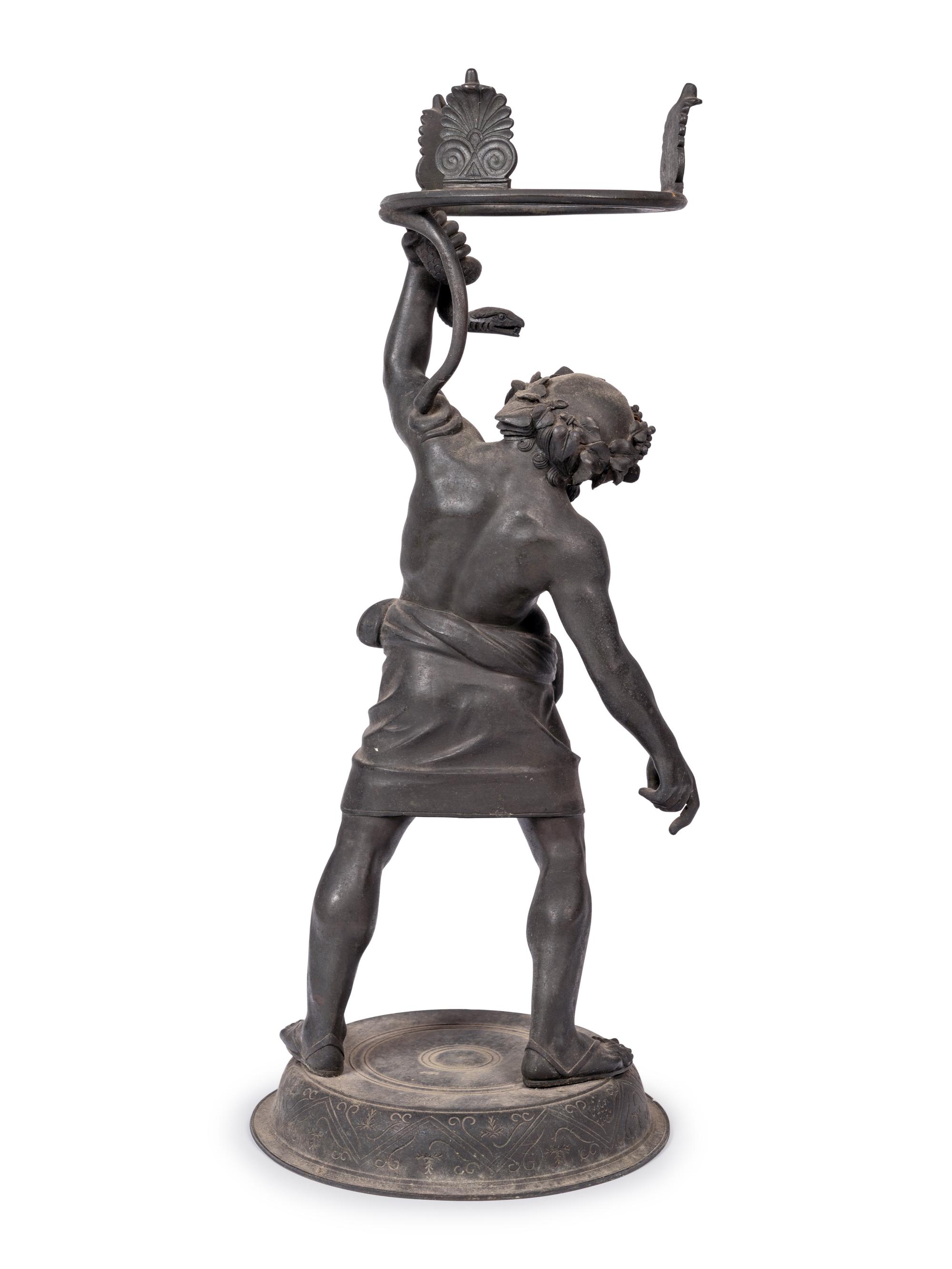 A Grand Tour Bronze Figure of Silenus Wrestling a Serpent