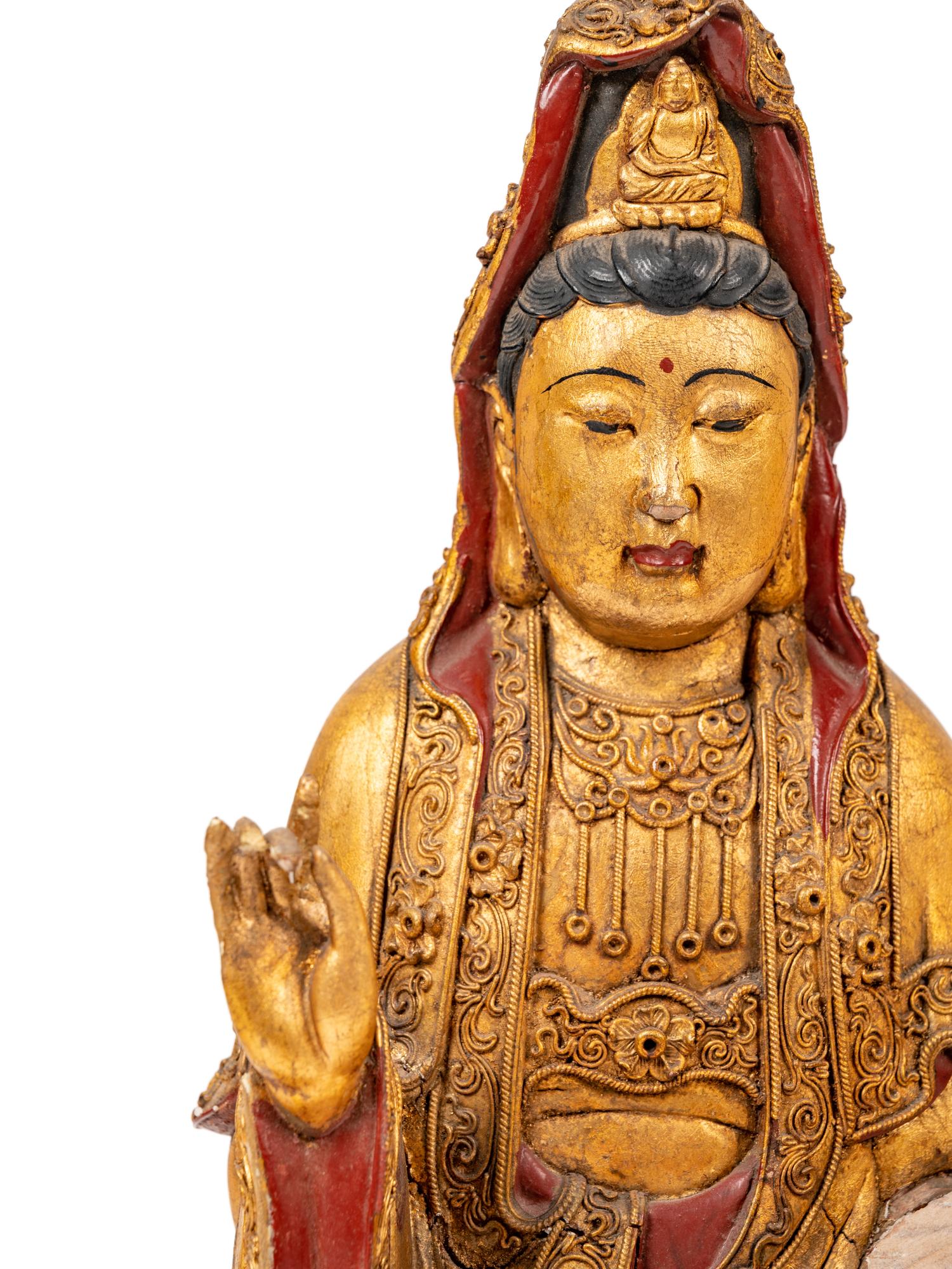A Chinese Gilt Lacquered Wood Figure of Guanyin