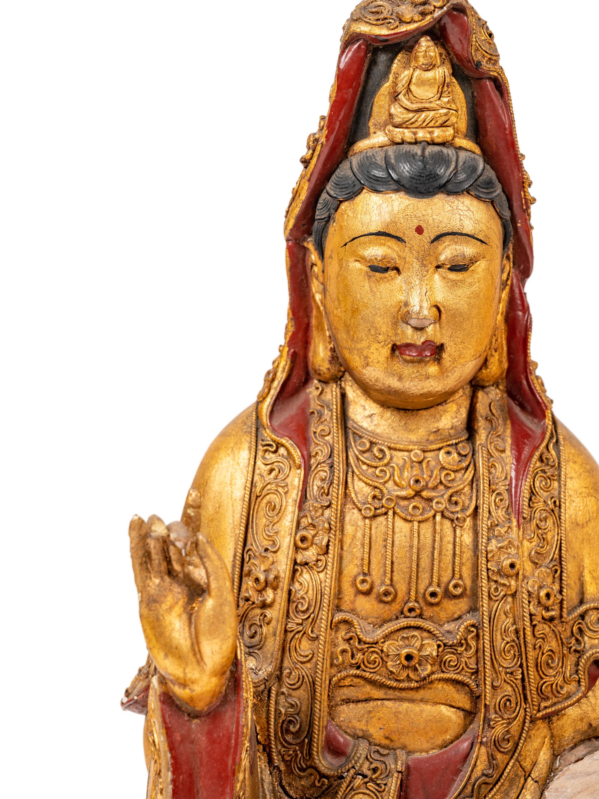A Chinese Gilt Lacquered Wood Figure of Guanyin