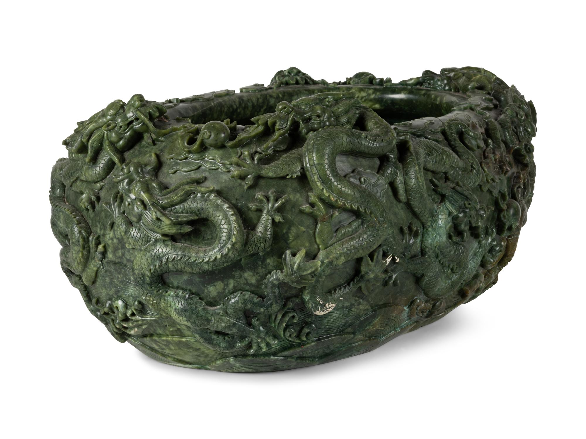 A Large Chinese Green Hardstone Fish Pot