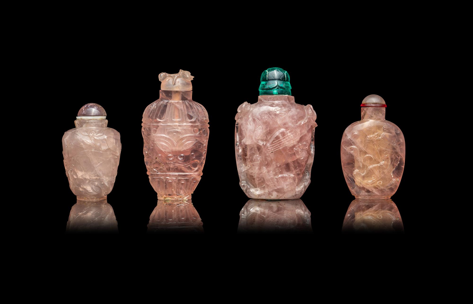 Four Chinese Rose Quartz Snuff Bottles