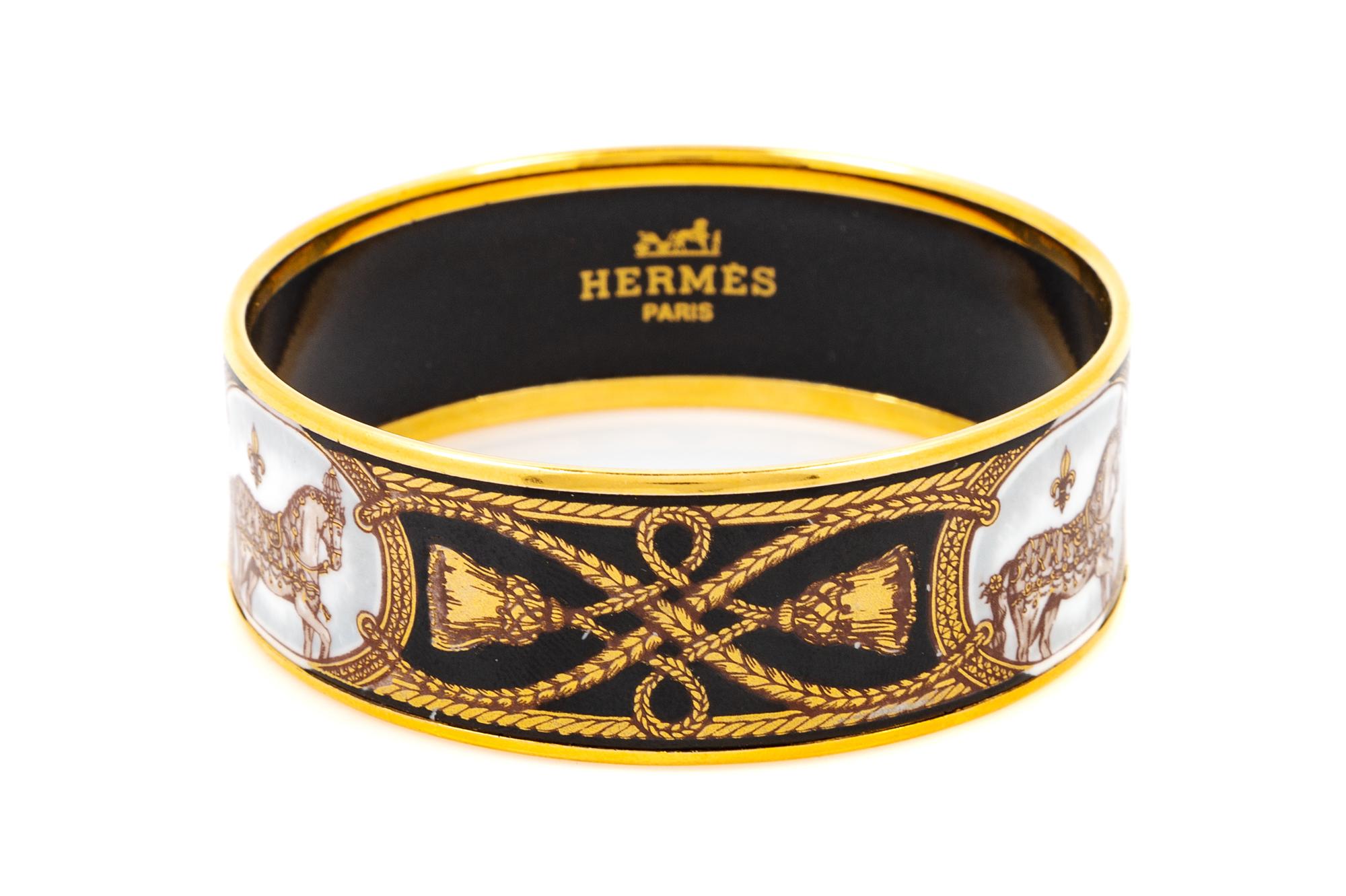 An Hermès Black Enamel 65mm Bangle, 2.5" diameter, .75" W.