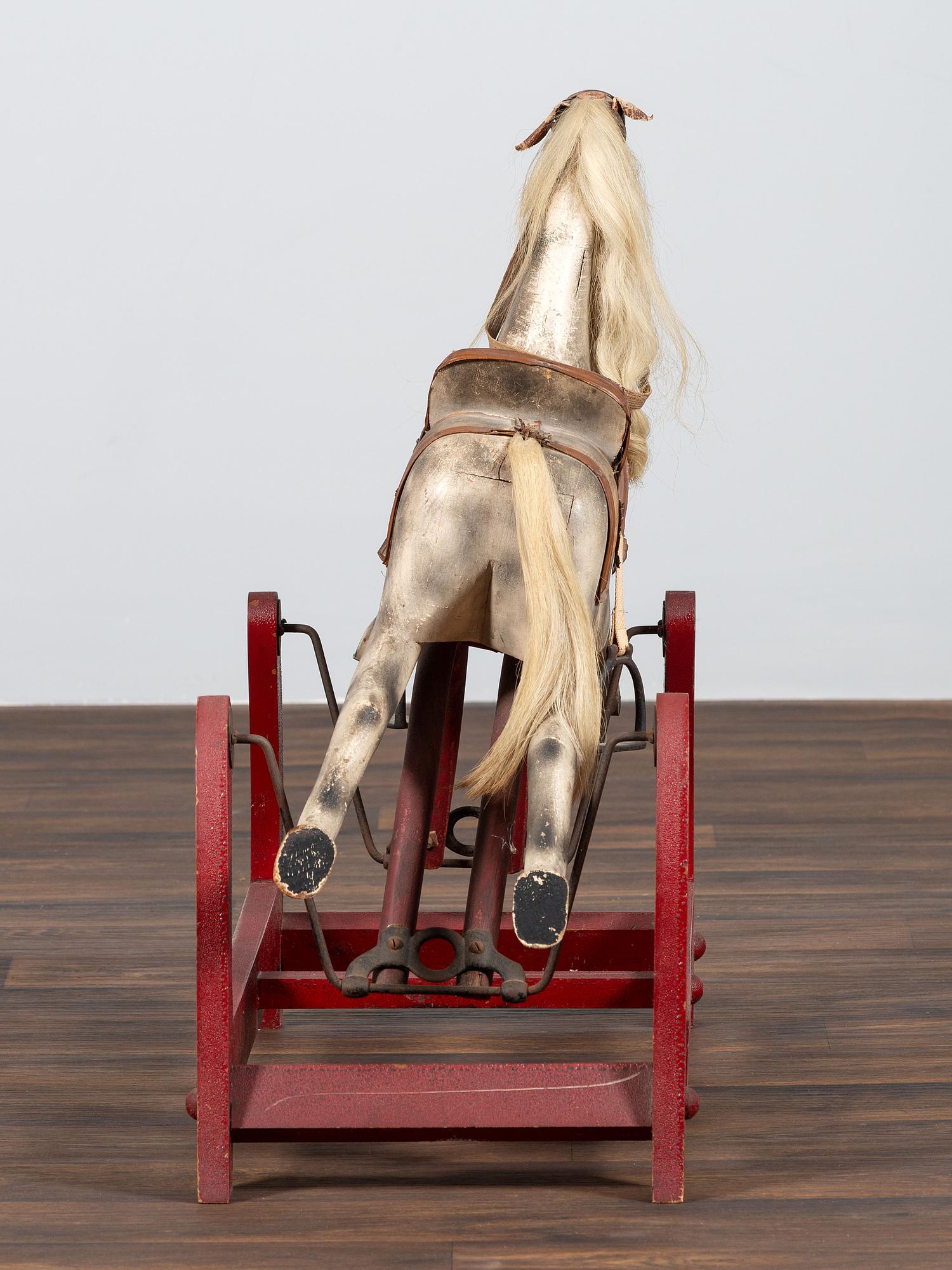 A Carved and Painted Wood Child's Riding Horse Toy