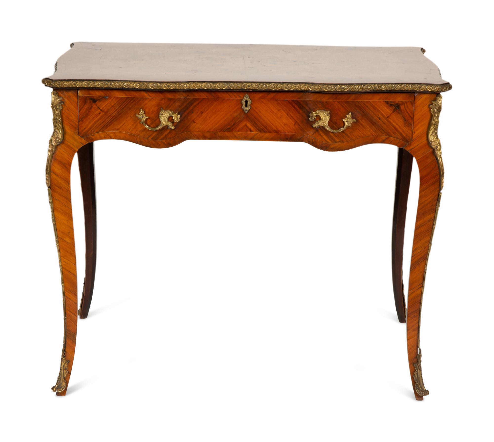 A Louis XV Style Gilt Metal Mounted Kingwood Writing Desk