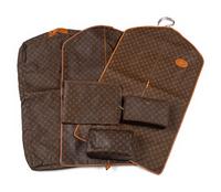 A Collection of Six Louis Vuitton Travel Accessories