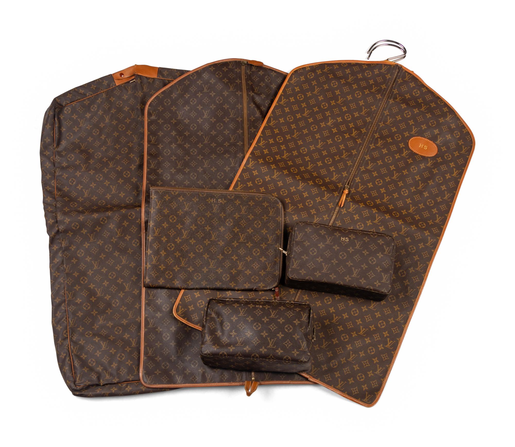 A Collection of Six Louis Vuitton Travel Accessories