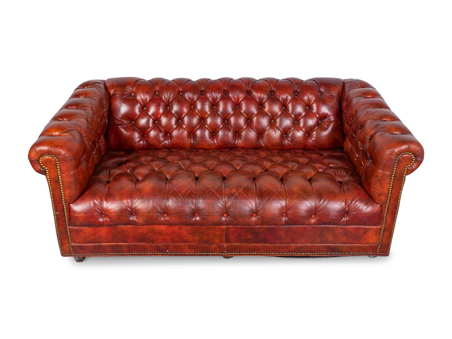 A Chesterfield Style Faux Leather and Brass Studded Sofa and Settee — 20TH CENTURY