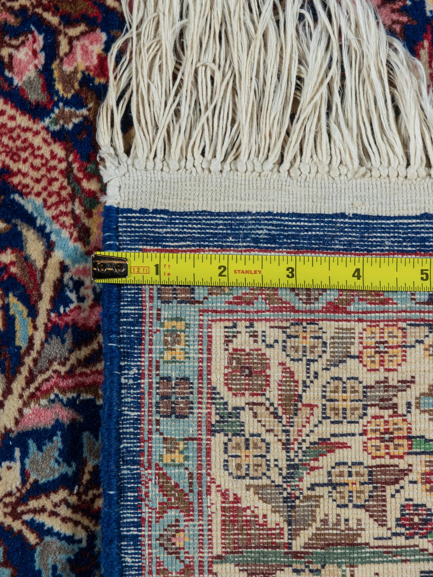 An Isfahan or Kirman Wool Rug